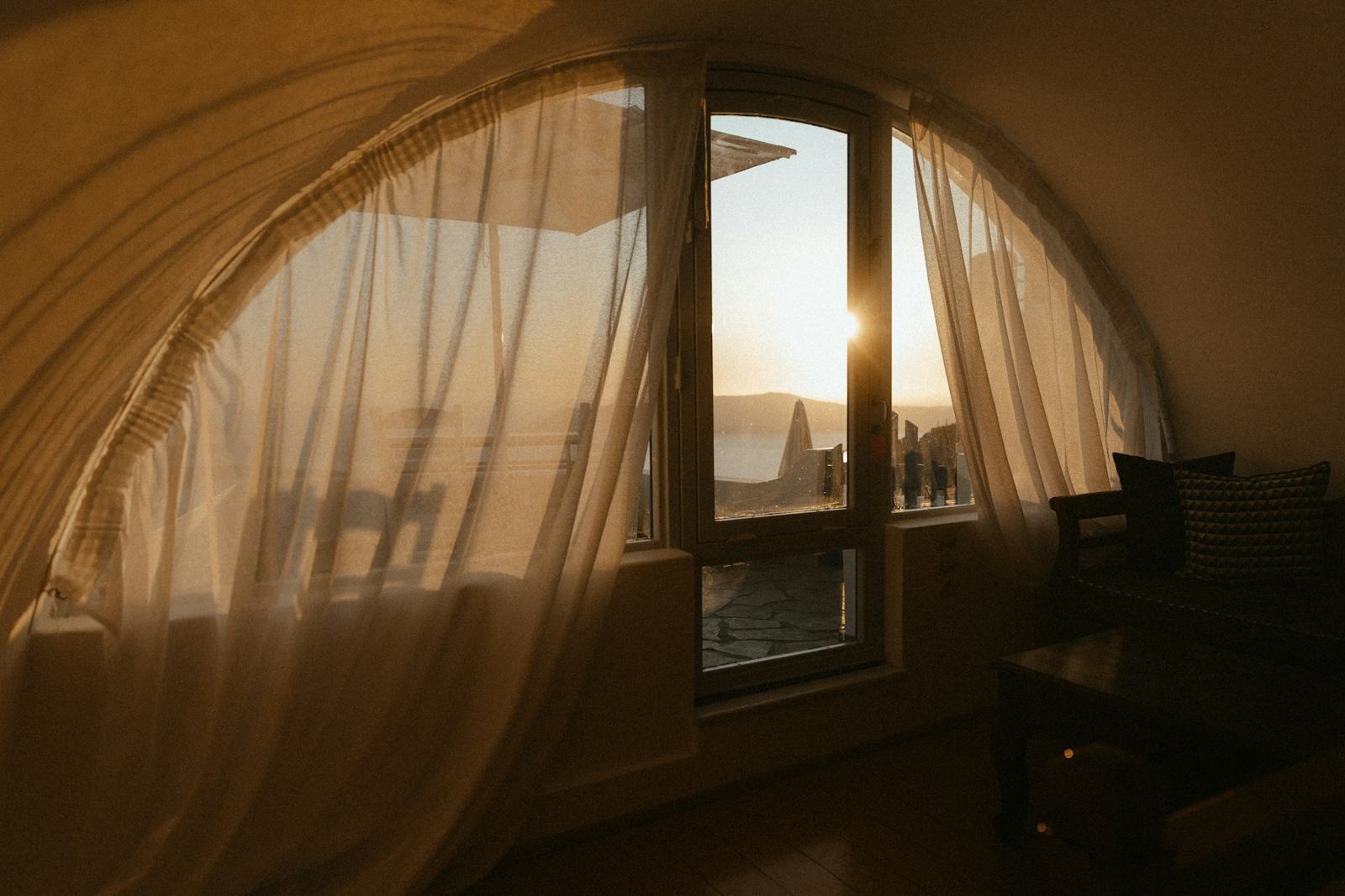 Evening light through tall windows